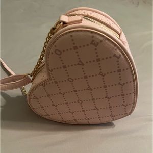 Heart shaped pink purse